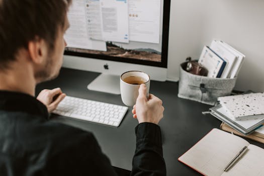 image of a person taking a break with coffee
